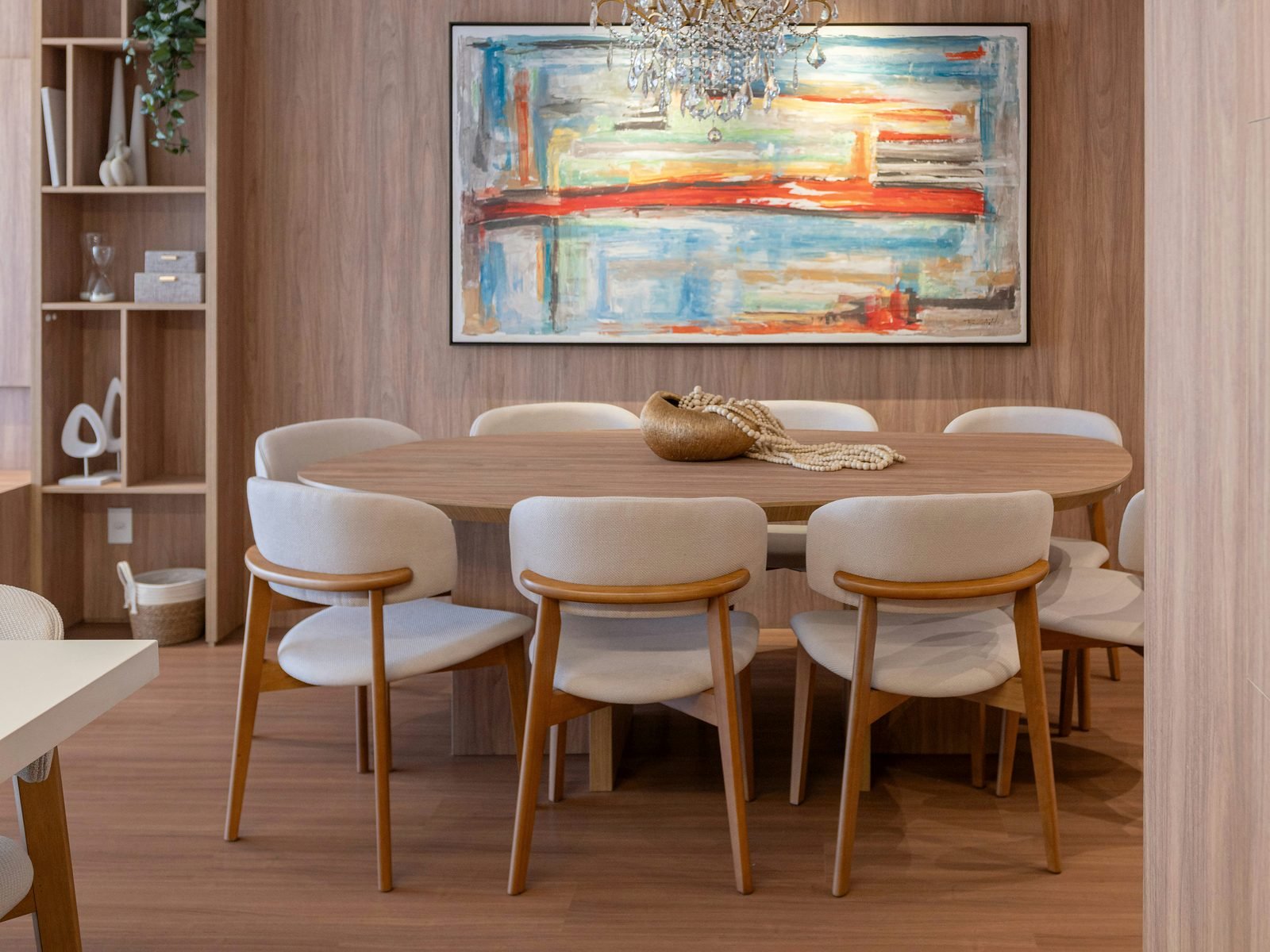Statement chandelier above a bespoke dining table